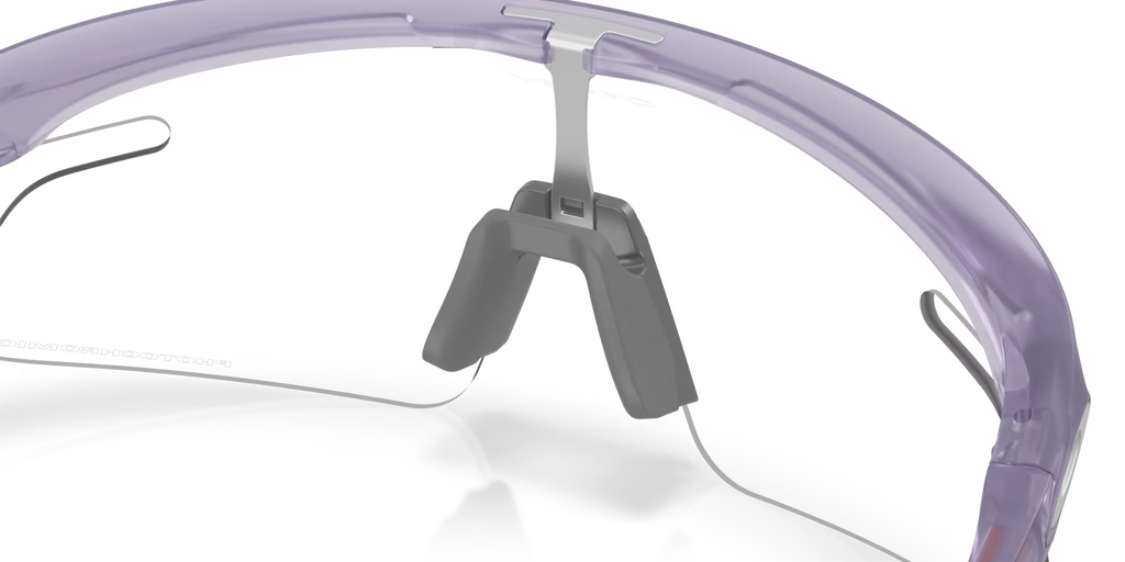 Oakley RSLV Lite Sunglasses – Clear to Black Iridium Photochromic Lens with Matte Transparent Lilac Frame