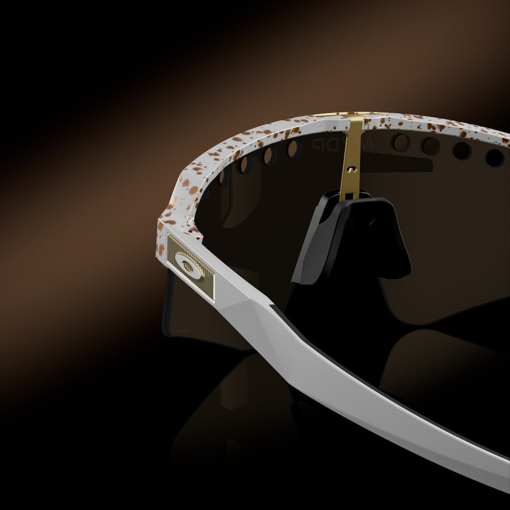 Oakley sunglass Mathieu Van Der Poel Signature Series Sutro Lite Sweep prizm 24k Lenses with red/gold splatter Frame - Cycling Gears Hub